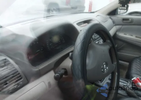 2003 Toyota Camry Le z USA, uszkodzony, nr VIN 4T1BE32K23U773023